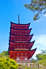 wood pagoda in front of mount fuji
