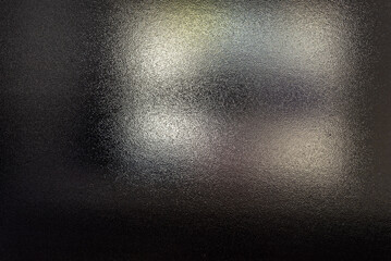 Colored light futuristic reflexions door glass grunge abstract silvery black surface background
