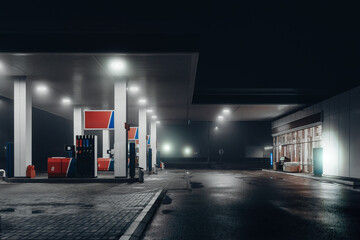 Gas station at foggy night - obrazy, fototapety, plakaty
