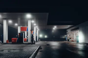 Fototapeten Gas station at foggy night © Mulderphoto