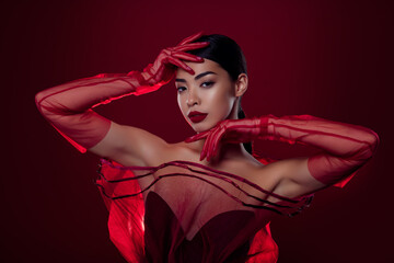 Photo of lovely asian girl femme fatale seductive model high fashion shoulders off isolated dark...