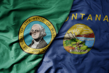 big waving colorful national flag of montana state and flag of washington state .