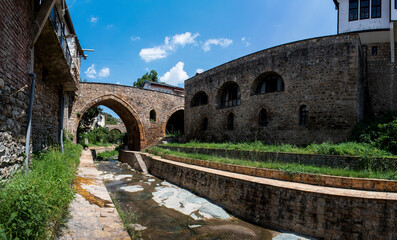 The old houses and stone bridges across the river that flows through Kratovo. It is located in the...