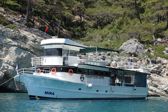 ANTALYA, TURKEY - MAY 15, 2021 Big white modern yacht moored in sea near Turkey coast. Luxury white boat yacht