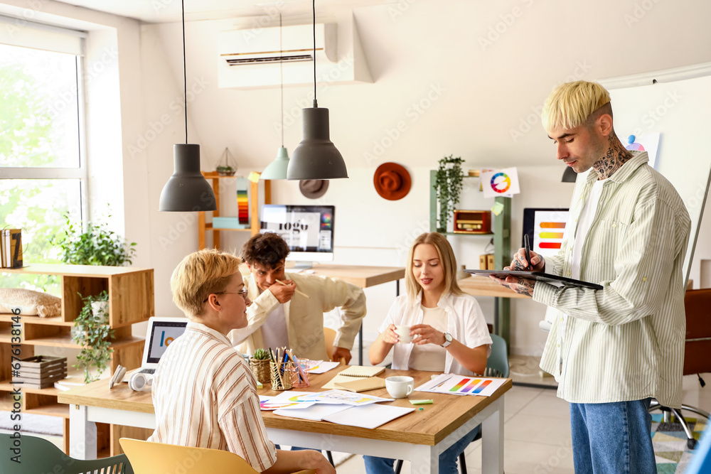 Poster Team of graphic designers working in office