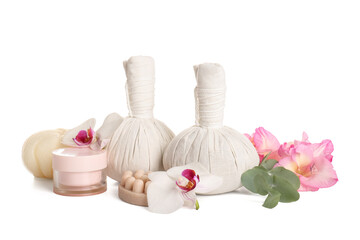 Beautiful spa composition with massage herbal bags on white background