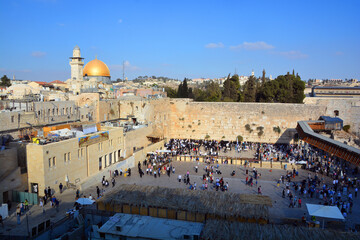 People pray a the Western Wall, Wailing Wall or Kotel the Place of Weeping is an ancient limestone...