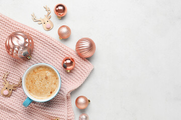 Cup of coffee with Christmas decor on white background