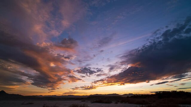 Timelapse of colorful sunset over the Utah desert near Simpson Springs as colors fade.