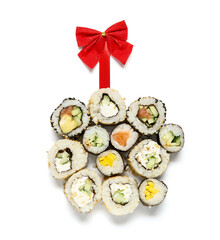 Composition with tasty sushi rolls and red bow for Christmas party on white background