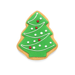 Delicious cookie in shape of Christmas tree on white background