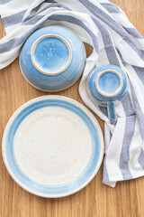 Top view of blue and white dish with upturn bowl and cup