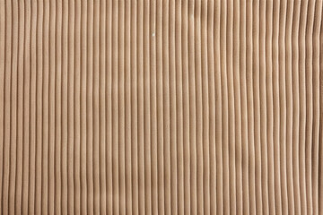 Tan corduroy fabric, closeup of surface material texture - Powered by Adobe