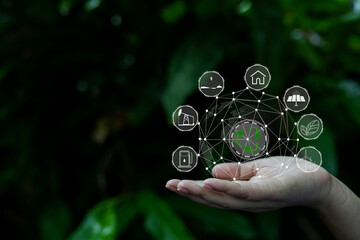 Technology, hand holding with environment Icons over the Network connection on green background.