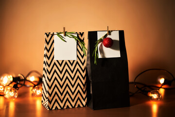 Christmas gift bags with decor and Christmas ornament.