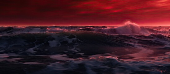 Fototapeta na wymiar The deep crimson of the blood like waves gently crashing against the silky smooth sea creates a stunningly mesmerizing background adding to the beauty of the water s cascading form and relax