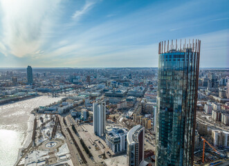 Yekaterinburg skyscraper aerial panoramic view at spring or autumn in clear sunset. Yekaterinburg is the fourth largest city in Russia located on the border of Europe and Asia.