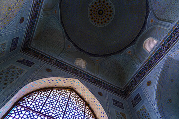 Ornament of the dome and interior of the Bibi Hanum mosque in Samarkand, Uzbekistan. Muslim oriental traditional geometric ornament.