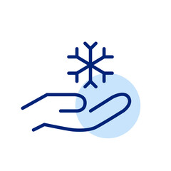 Obraz premium Hand holding a snowflake. Winter holidays and Christmas symbols. Pixel perfect, editable stroke icon