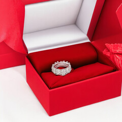 valentines ring in a red gift box background