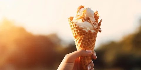 Foto auf Alu-Dibond Woman's hands holding melting ice cream waffle cone in hands on summer light nature background : Generative AI © Generative AI