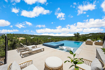 a luxury infinity pool with a view - obrazy, fototapety, plakaty