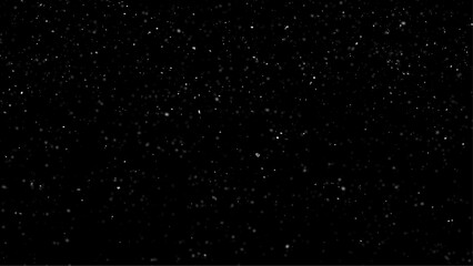 Falling Snow down On The Black Background. Snowstorm texture. Bokeh lights on black background, shot of flying snowflakes in the air
