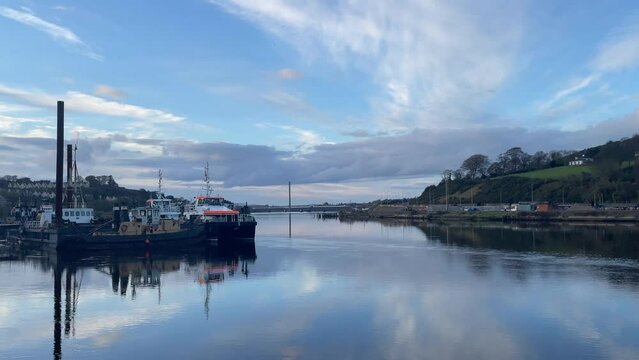 Docks Waterford Ireland on a calm winter evening with a full tide on the river Suir a tranquil evening