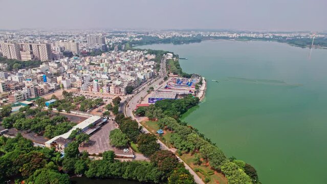 hyderabad neckless road near tank bund aerial view  drone establishing shot  daytime 4k