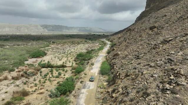 aerial drone footage of following a Vehicle in the beautiful valley hingol balochistan Pakistan