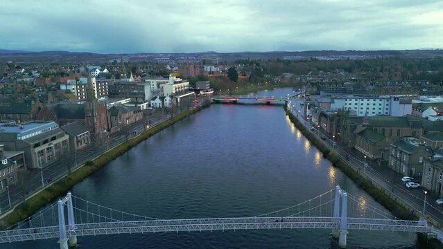 Flying South over the Greig Street bridge travelling up river Ness through the city