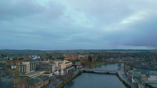Flying high above the historic city of Inverness looking inland to the south 