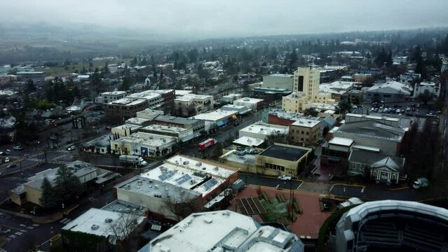 Ashland, Oregon, USA, Winter 2023.  Downtown. Moving from West to East over downtown.  To the right is the OSF Elizabethan Theater, and the tall building is the Ashland Springs Hotel