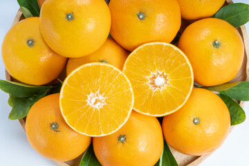 Close up, Fresh Orange fruit on white background, Japanese Ehime Orange with slices isolate on white background.