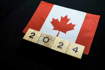 2024, Canada, Canada flag with date block, Concept, Important events for Canada in the new year, election, economy, social activities, central bank, Canada foreign policy