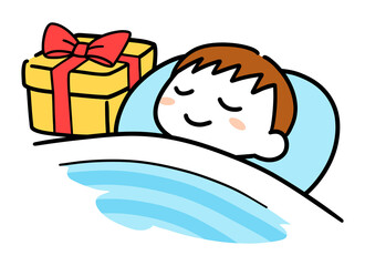 眠っている男の子の枕元に置かれたクリスマスプレゼント