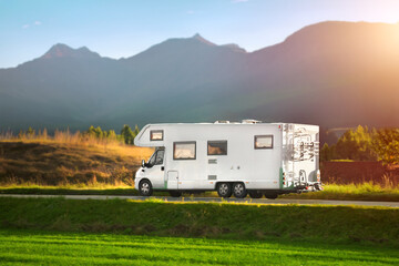 RV motorhome camper van on the highway with bike rack. Travel vacation adventure. Tourists in...