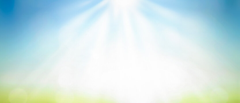 ESG concept, abstract blurred beautiful soft green bokeh light grass and blue sky autumn sunrise background