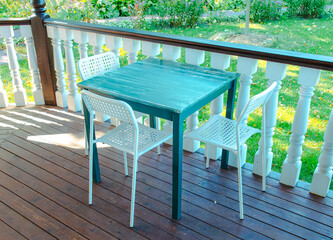 Blue wooden table in a summer cafe