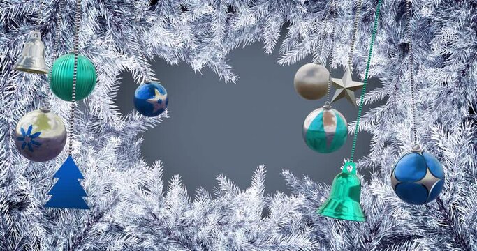 Animation of hanging bauble, tree, bells with snow covered pine leaves against gray background