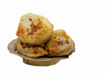 Panipuri or Golgappa in a Dry Leaves Disposable Bowl Isolated on White Background with Copy Space,...