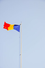 romanian flag against the blue sky