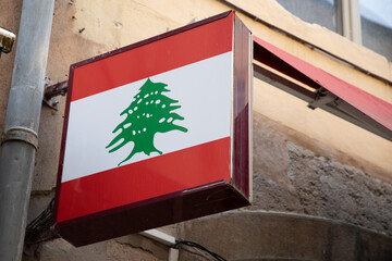 Lebanese national flag on wall building facade lebanon restaurant shop