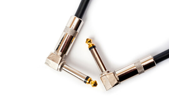 Jack cord for guitar and connection of various musical devices, pedals, amplifier and so on. - Powered by Adobe