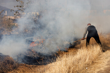 steppe fires during severe drought completely destroy fields. Disaster causes regular damage to...
