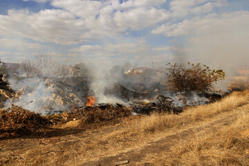 steppe fires during severe drought completely destroy fields. Disaster causes regular damage to...