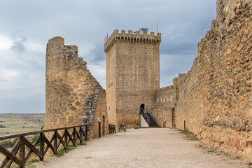 Peñaranda de Duero, Spain - October 13, 2023: ruins of the medieval castle in the town of Peñaranda de Duero in the province of Burgos, Spain - obrazy, fototapety, plakaty