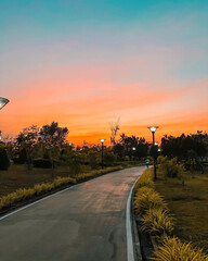 route of the road that is during the sunset.