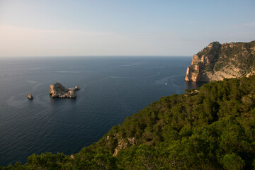 Views of the sea and Ses Margalides of ​​Ibiza from the cliffs in the north of the island in Santa Agnes de Corona