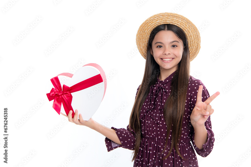 Poster child girl 12-14 years old with gift on isolated white background. birthday, holiday concept. teenag